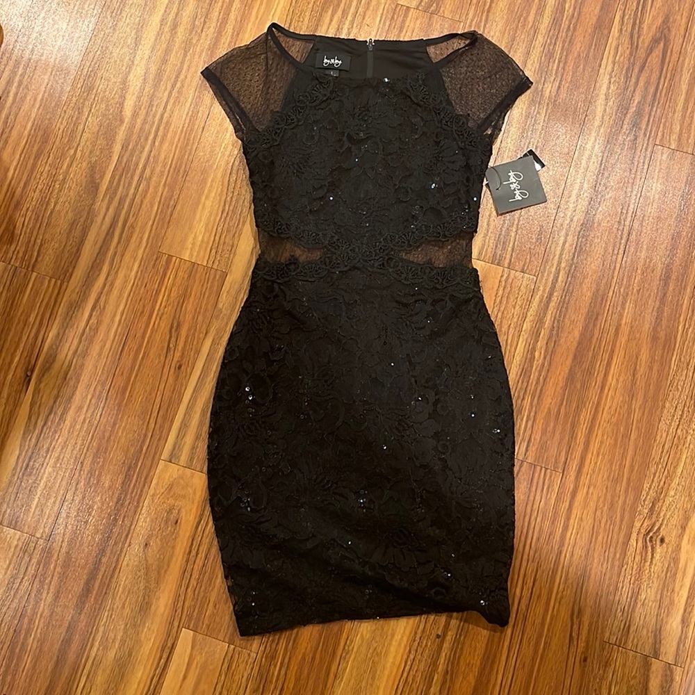 Black dress with cutouts and sequins